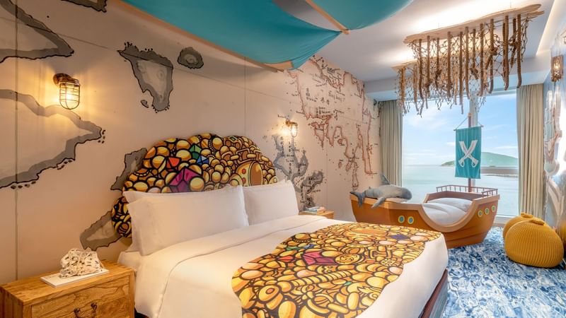 Comfy bed and lounge in Pirate Paradise Room at Fullerton Ocean Park Hotel Hong Kong