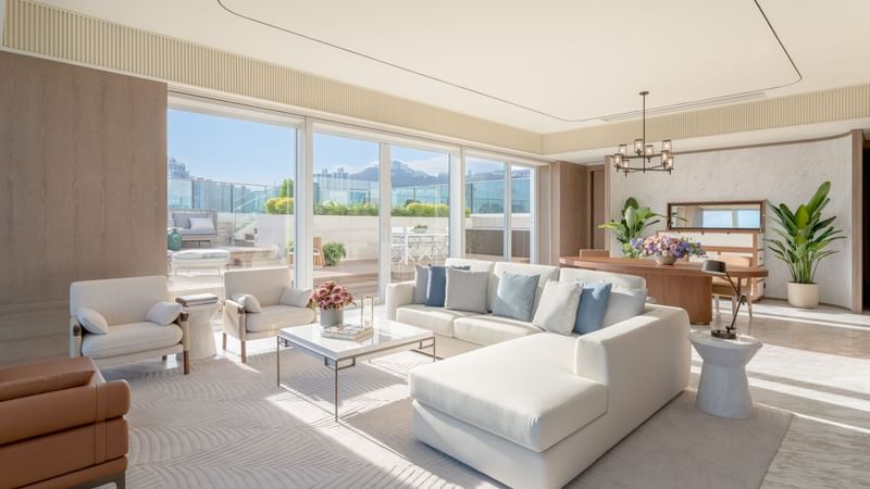 Living area with sofas in The Fullerton Pool Suite at Fullerton Ocean Park Hotel Hong Kong
