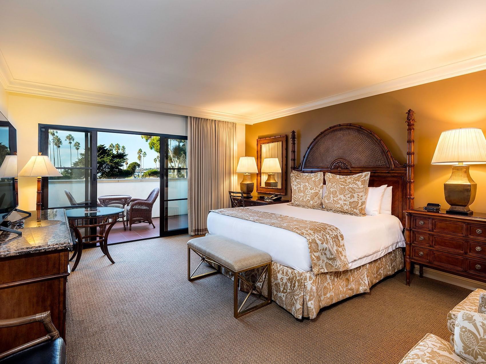 Modern Parkside Partial Ocean View King at Santa Barbara Inn featuring a king bed, elegant decor and a cozy balcony terrace