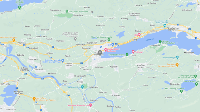 Mappa con indicazioni di località e strade, evidenziando una zona specifica con puntini rossi e arancioni.